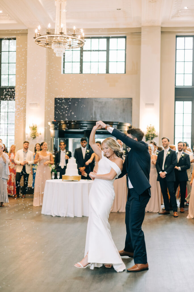 A bride dancing with her father at a wedding reception taken by the carters creative wedding photographers in ColUmbia South Carolina.