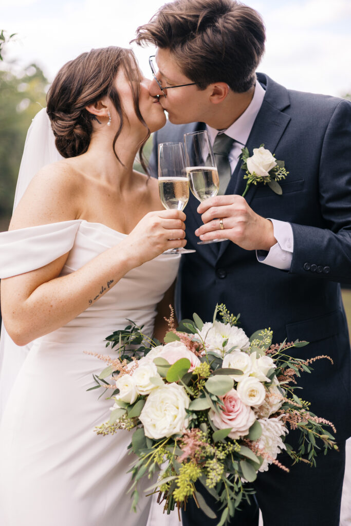 Bride and Groom portrait showing emotion and joy displaying the importance of investing in luxury wedding photos