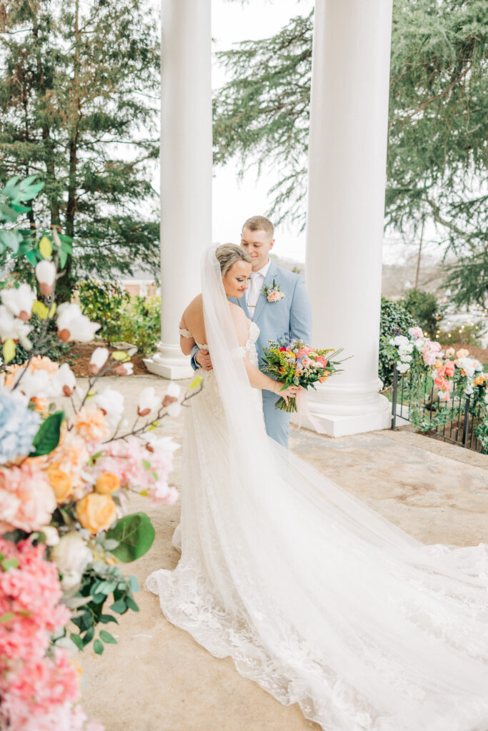 Bride and Groom portrait showing emotion and joy displaying the importance of investing in luxury wedding photos