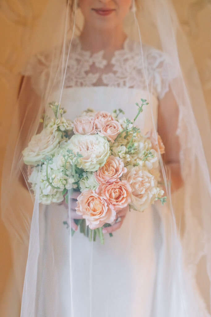 Bridal portrait of a wedding in Columbia South Carolina. The bride is holding flowers and knows why wedding photos are worth the investment