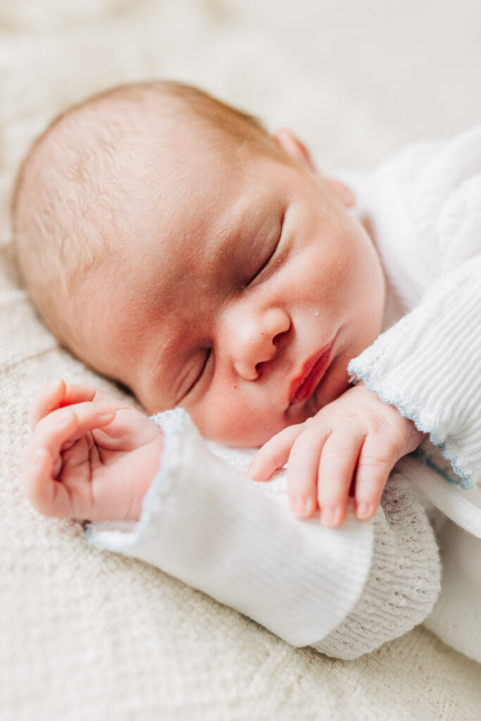 Close-up of newborn baby sleeping during lifestyle newborn photography