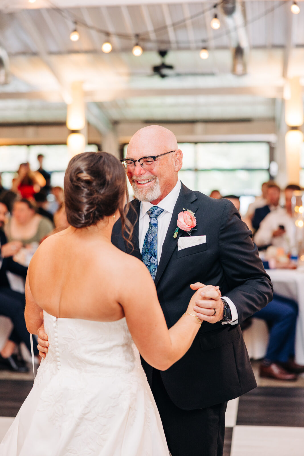 An emotional moment between a smiling father and his daughter 
