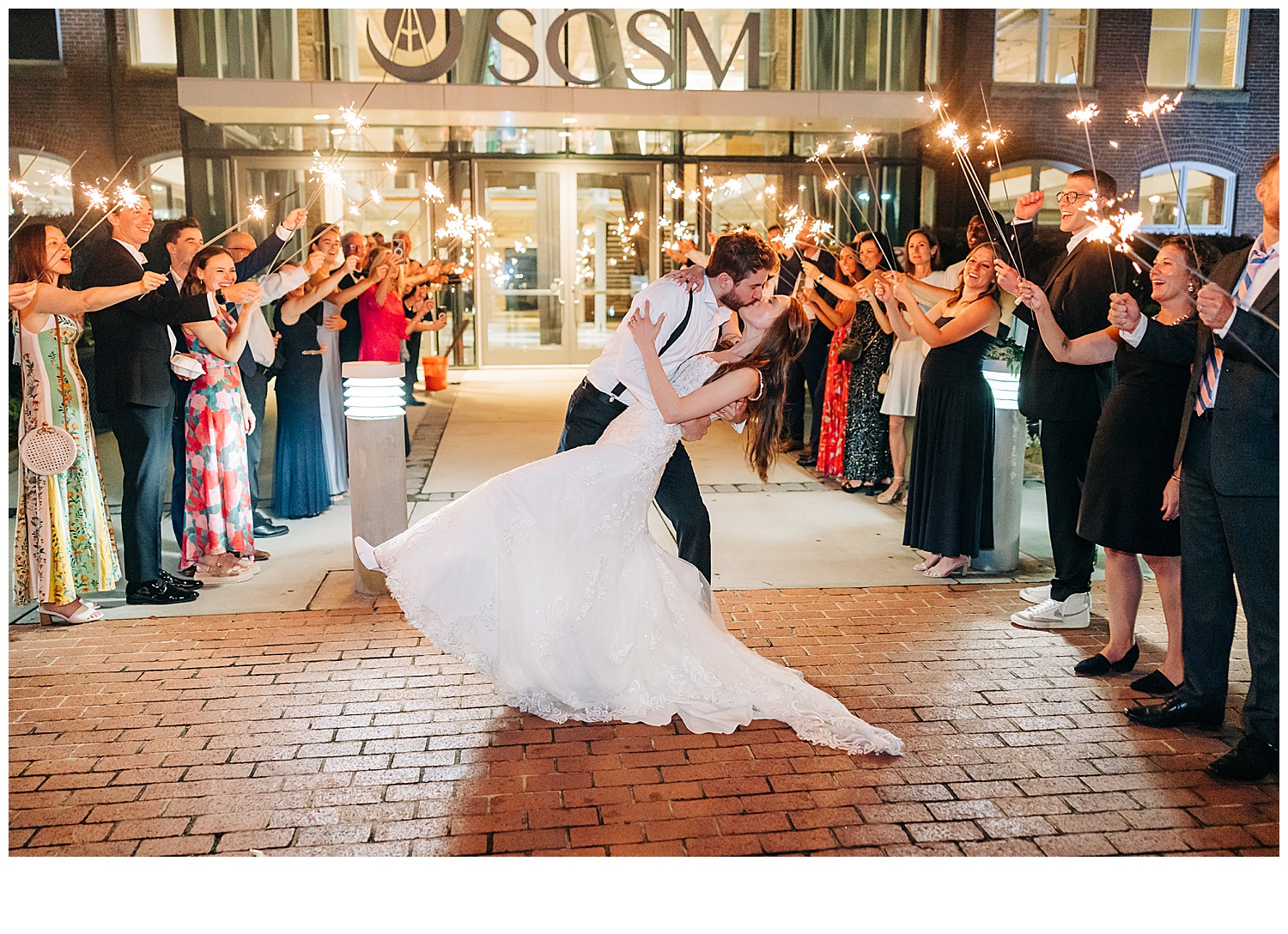 Bride and groom with their last kiss before the leave as now husband and wife