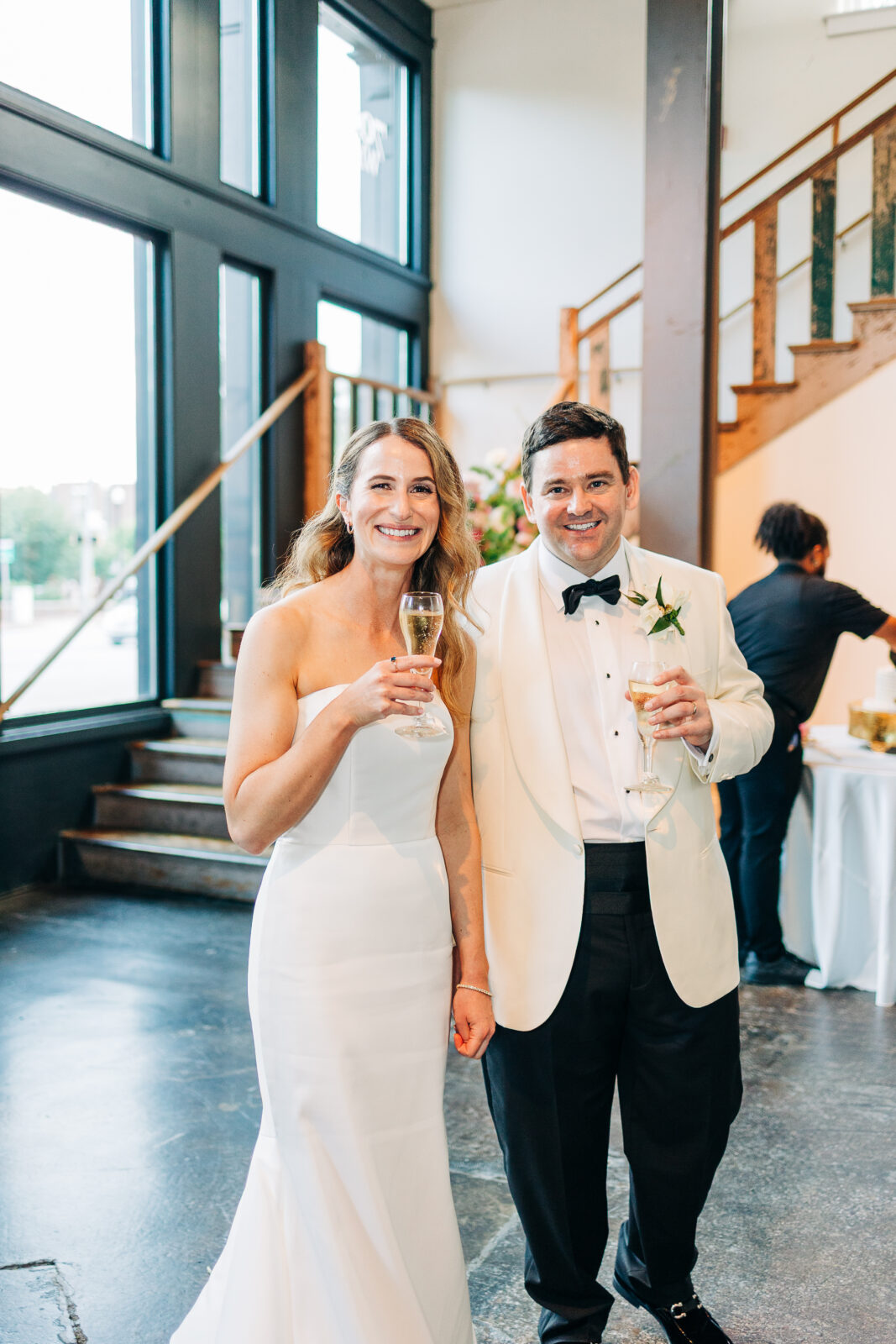 A smiling newlywed couple