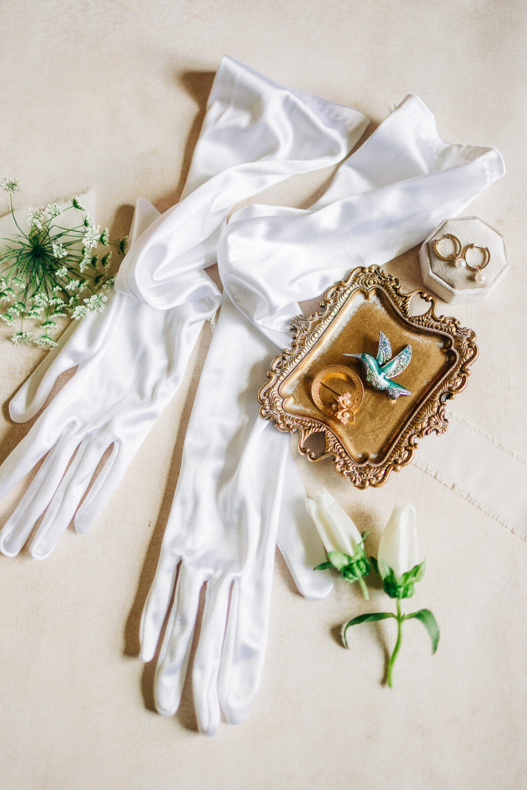 Detail photos at the beginning of the wedding day featuring her grandmother's vintage gloves