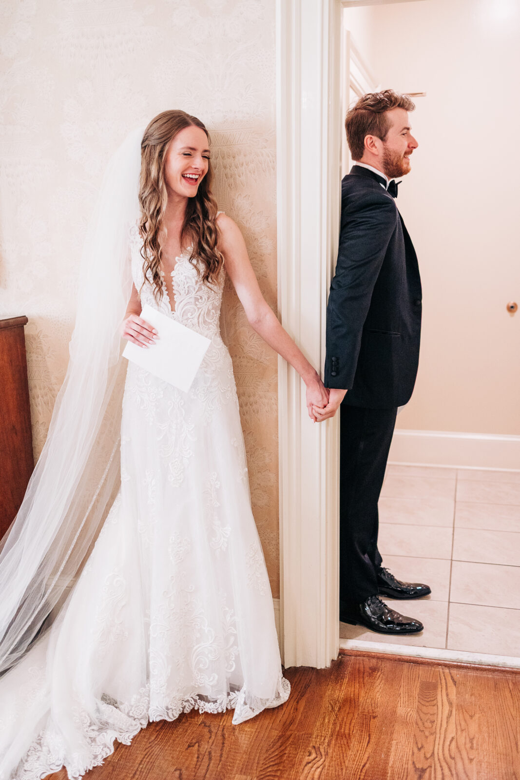Couple laughing during golden hour – candid wedding photo