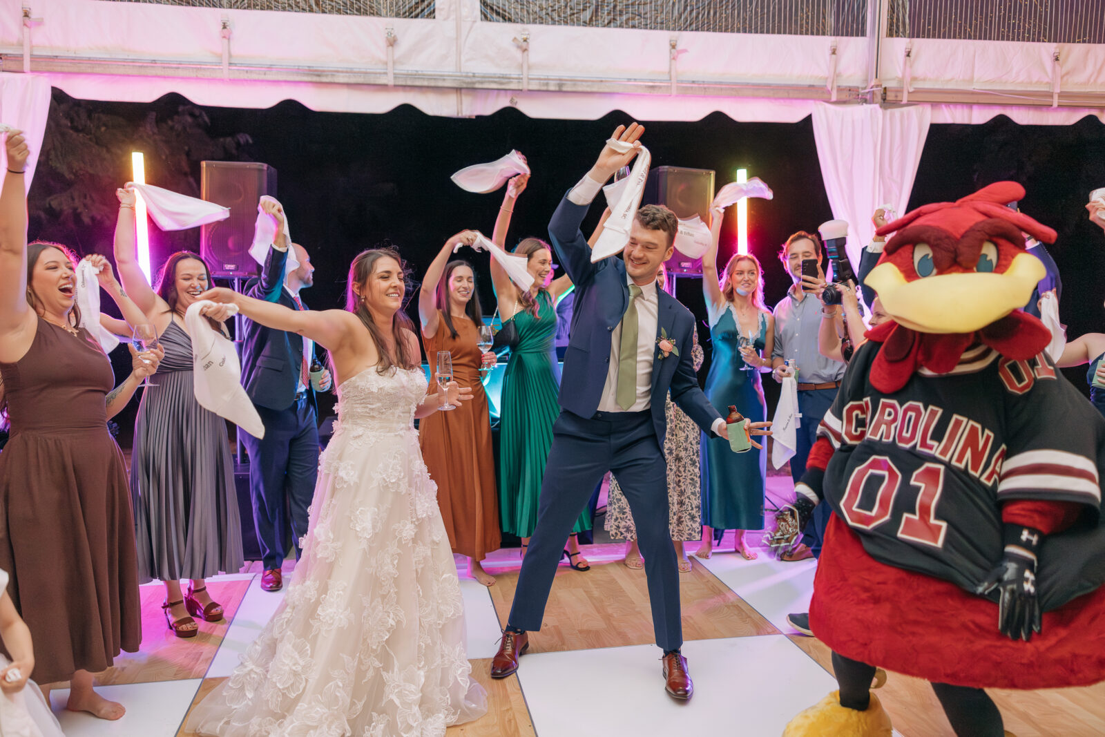 Guests dancing with USC mascot during Columbia wedding reception at The Millstone at Adams Pond