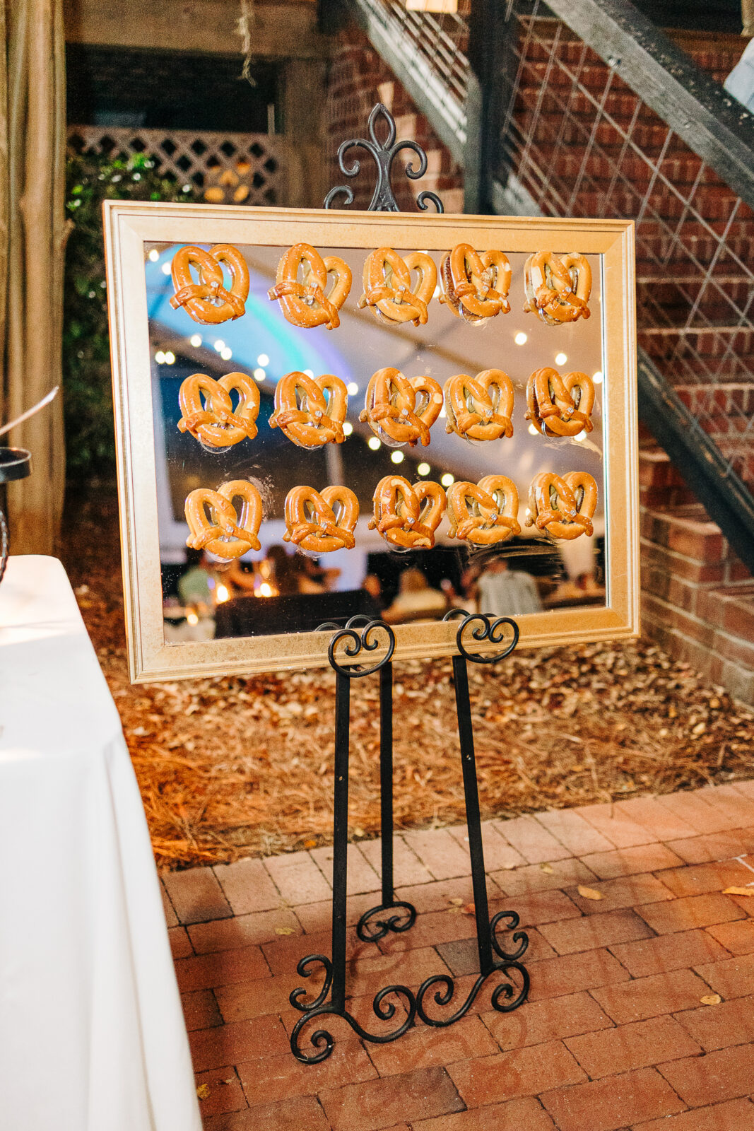 Close-up of the happy couple toasting with champagne and a vibrant bouquet in Columbia, SC