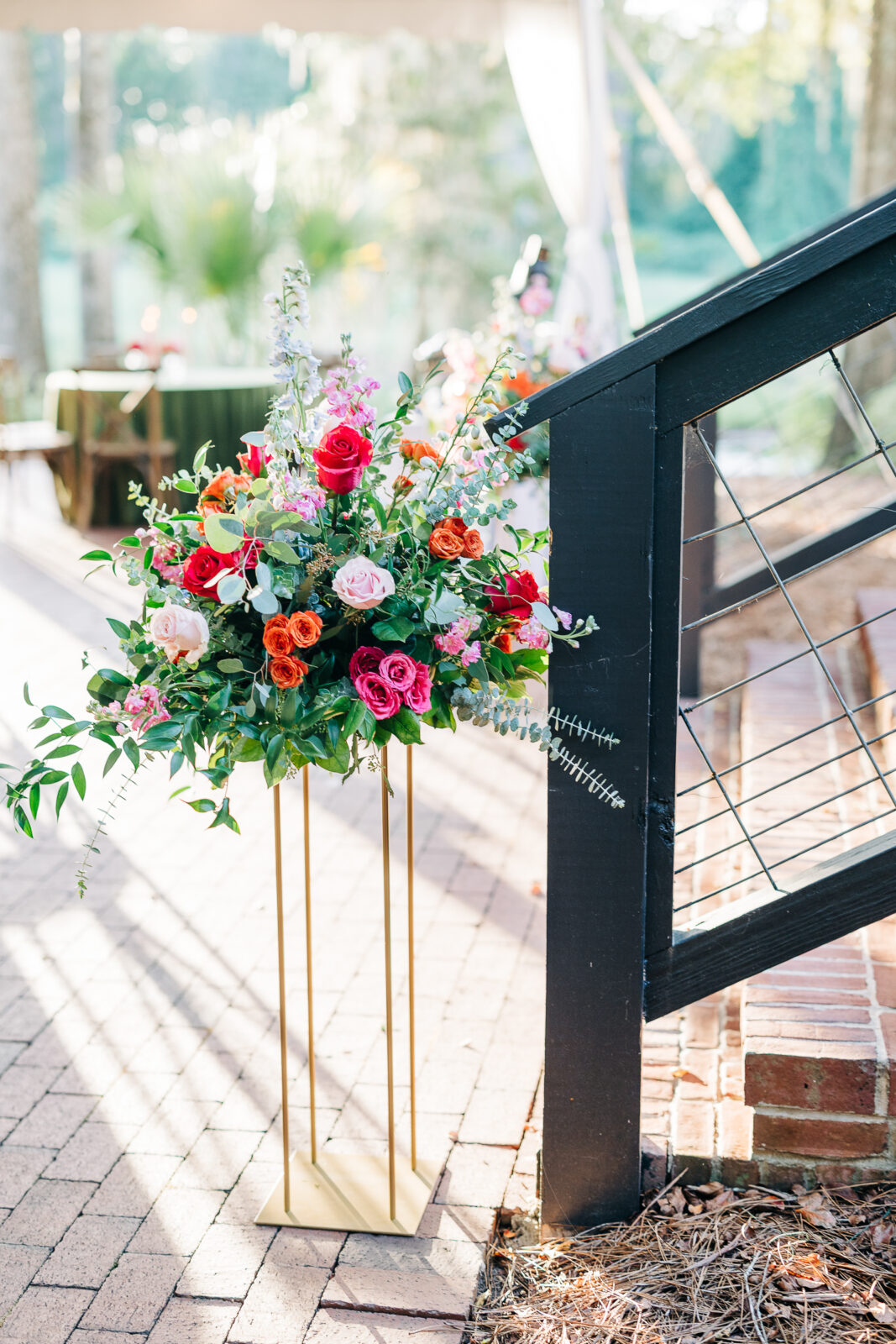 Floral arrangement, wedding decor at The Millstone at Adam’s Pond