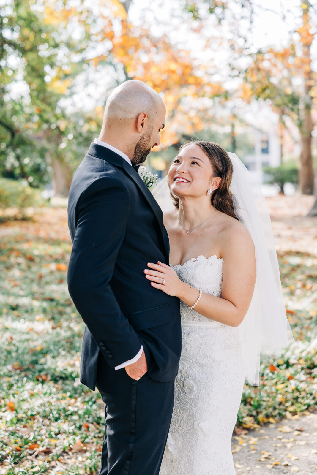 Bride and Groom fondly looking at each other in soft natural light during their South Carolina wedding 
