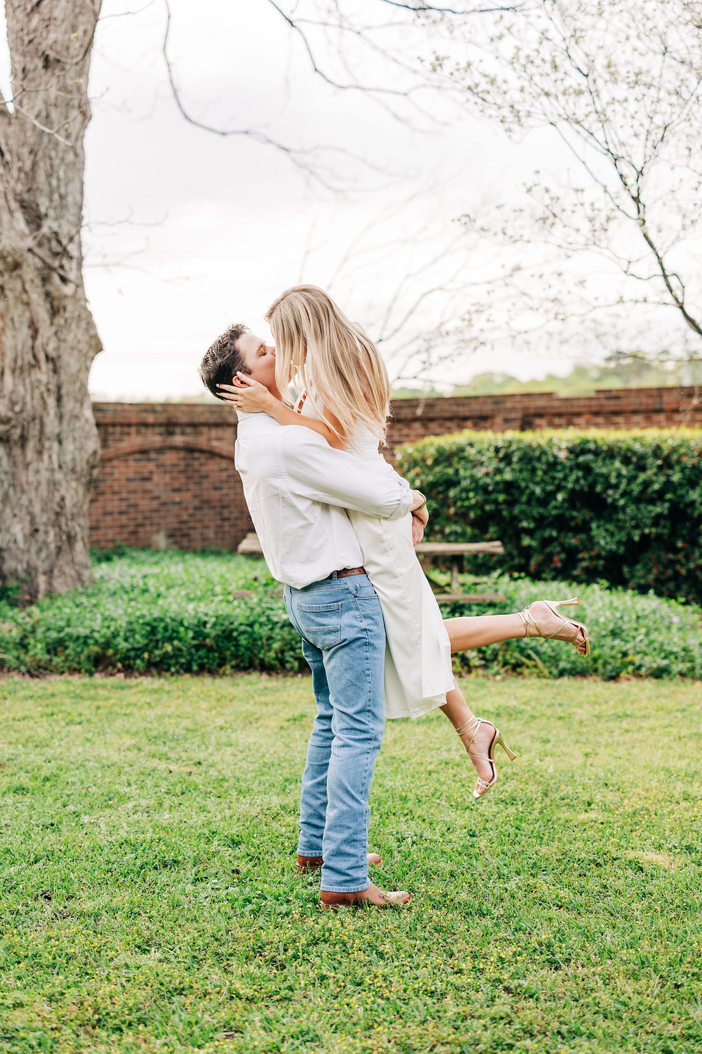 Classic engagement photo location in a garden setting near Columbia showcasing timeless Southern charm