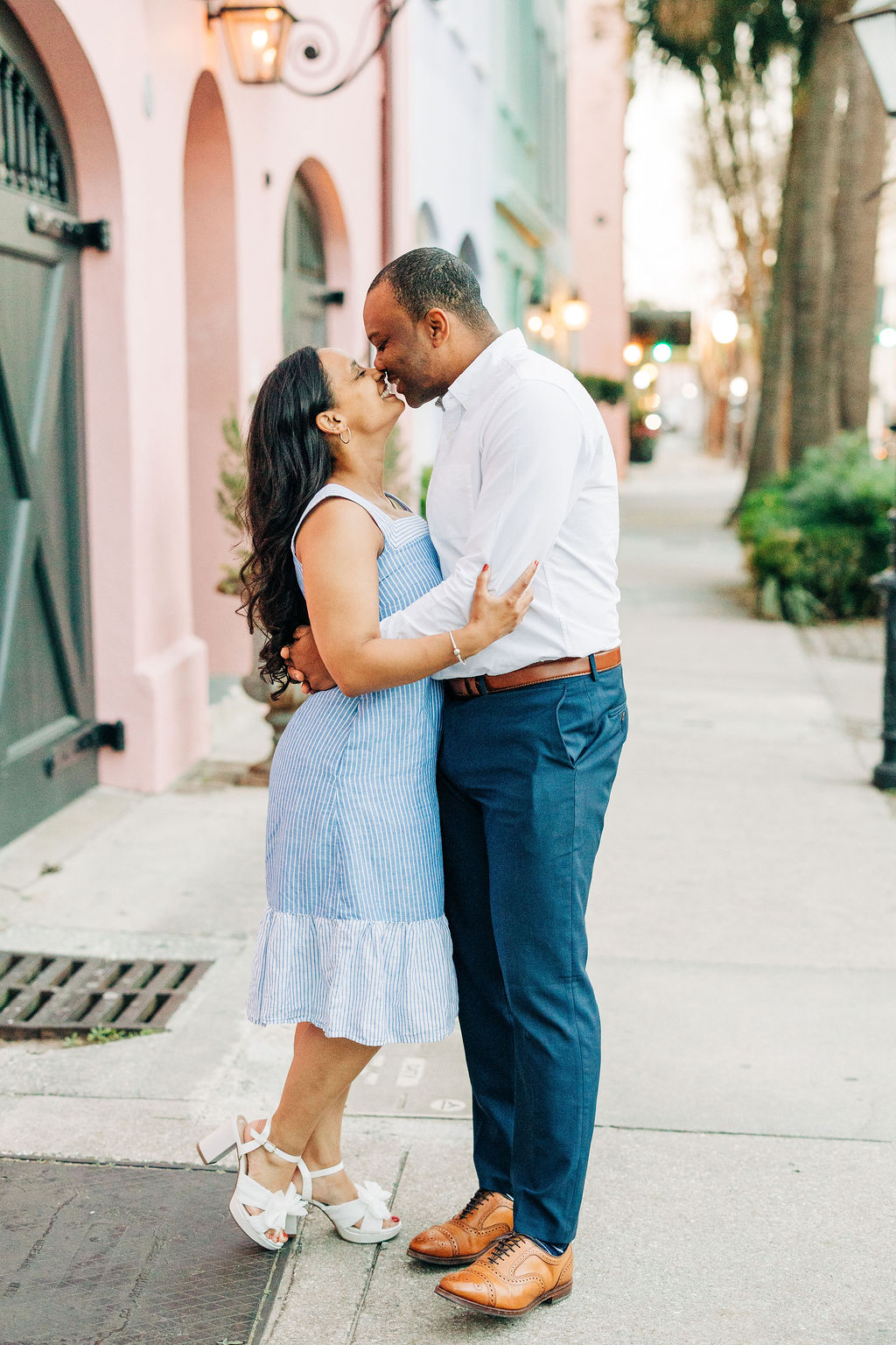 Intimate engagement moment captured along the waterfront during a Southeast engagement session