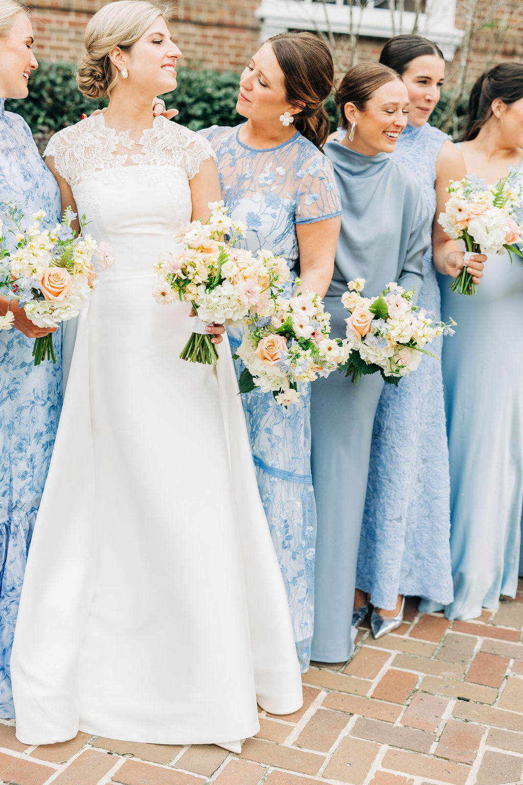 Bridesmaids walking with the bride during a Columbia, SC wedding photography and videography experience