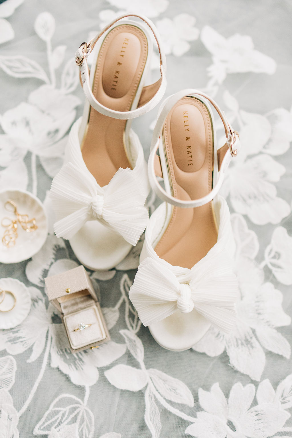 Elegant bridal shoes and engagement ring photographed during wedding photography and videography in Columbia, SC