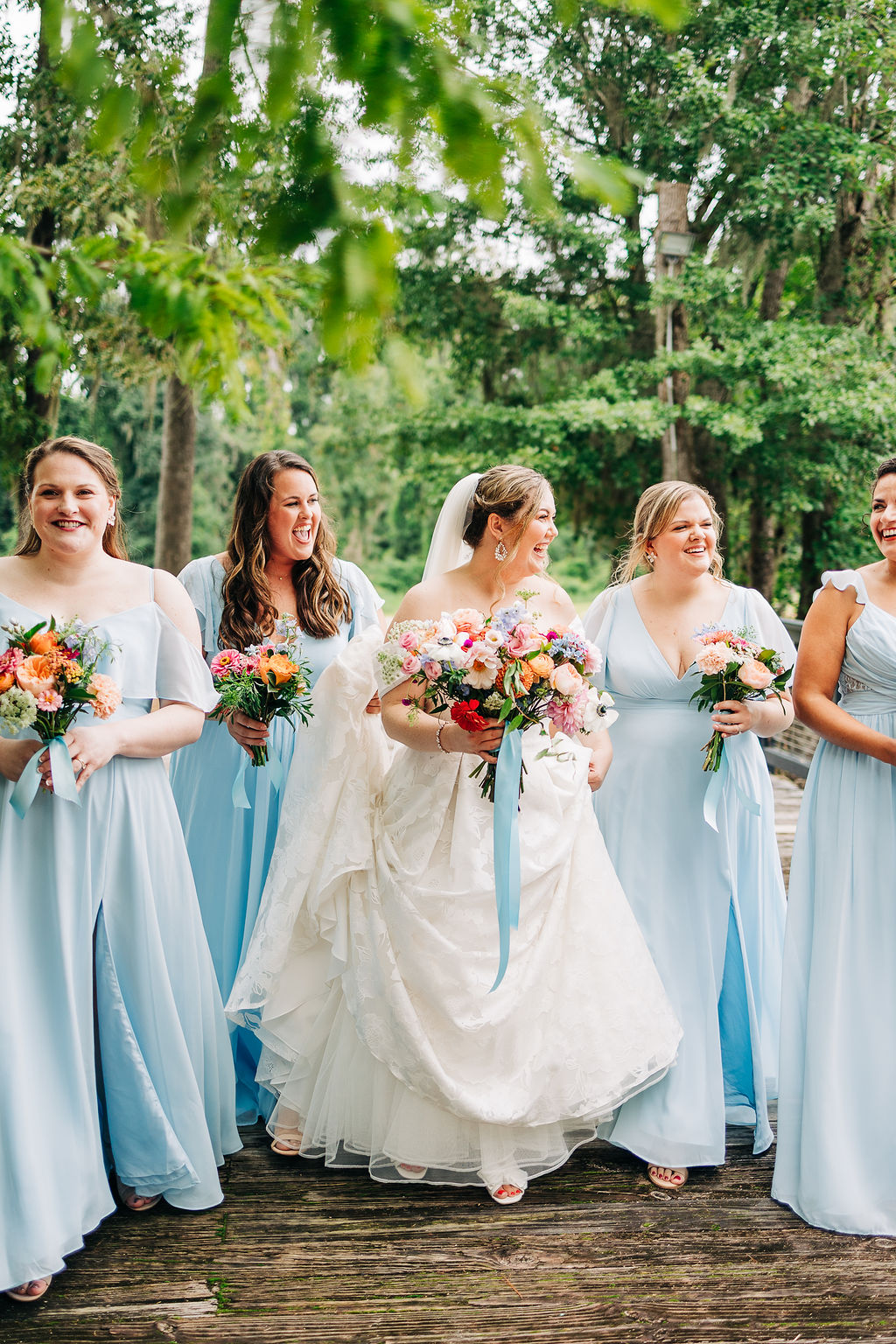 Bridesmaids walking with the bride during a Columbia, SC